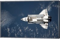 Aerial view of Space Shuttle Discovery over Earth Fine Art Print