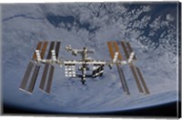 International Space Station set against the background of a cloud covered Earth Fine Art Print