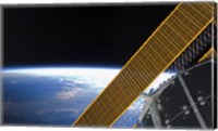 Solar array Panels on the International Space Station Backdropped Against Earth's Horizon Fine Art Print