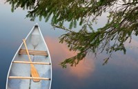 Canada, Quebec, Eastman Canoe On Lake At Sunset Fine Art Print