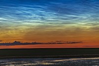 Comet NEOWISE and Noctilucent Clouds Over a Pond Framed Print