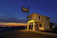 Sunset at Lucille's Service Station Framed Print