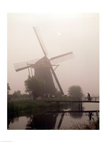 Windmill and Cyclist, Zaanse Schans, Netherlands black and white Fine Art Print