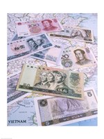 Close-up of yuan notes on a map Fine Art Print