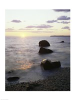 Rocks on the beach at sunrise Fine Art Print