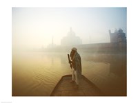 Silhouette of a man standing on a boat in the Yamuna River, Taj Mahal, Agra, Uttar Pradesh, India Fine Art Print