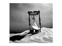 Close up of hourglass on sand Fine Art Print