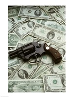 Close-up of a handgun with paper currency Fine Art Print