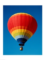 Low angle view of a hot air balloon in the sky, New Mexico, Rainbow Fine Art Print