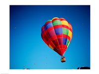 Rainbow Hot Air Balloon with other Hot Air Balloons Far Away Fine Art Print