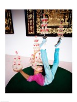 Acrobat balancing glasses, Shanghai, China Fine Art Print