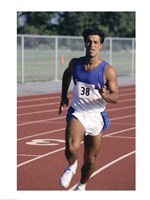 Male athlete running on a running track Fine Art Print