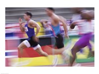 Side profile of three men running on a running track Fine Art Print