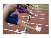 Side profile of three people jumping a hurdle Fine Art Print