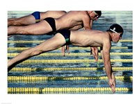 Side profile of three swimmers jumping into a swimming pool Fine Art Print