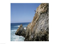 Mexico, Acapulco, La Quebrada, Cliff divers on cliff Fine Art Print