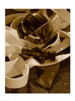 Close-up of a firefighter's helmet on a fire hose Fine Art Print