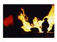 Firefighters In front Of Flames Extinguishing A Fire Fine Art Print