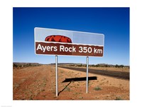 Distance sign on the road side, Ayers Rock, Uluru-Kata Tjuta National Park, Australia Fine Art Print
