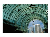 Low angle view of sculptures of birds in a shopping mall Fine Art Print