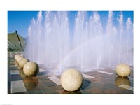 USA, California, Stockton, Weber Point Events Center, Rainbow created by water splashing from fountain Fine Art Print