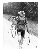 Italian Giusto Cerutti has a broken wheel after a fall. Tour de France 1928 Fine Art Print