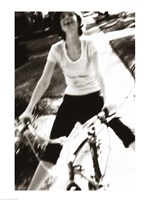 Young woman riding a bicycle - black & white Fine Art Print