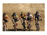 Group of people riding bicycles in a race Fine Art Print