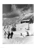 USA, Washington state, three people carrying their skis Fine Art Print