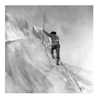 Washington - Mount Rainier Guide cutting steps on ice slope near summit Framed Print