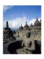 Buddha statue in front of a temple, Borobudur Temple, Java, Indonesia Fine Art Print