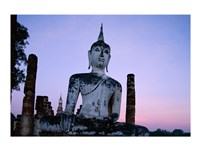 Low angle view of the Seated Buddha, Wat Mahathat, Sukhothai, Thailand Fine Art Print
