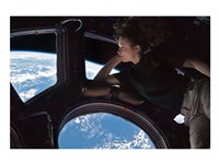 Tracy Caldwell Dyson in the Cupola Observing the Earth during Expedition 24 Fine Art Print