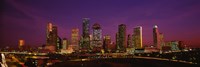 Buildings lit up at night, Houston, Texas, USA by Panoramic Images - 27" x 9"