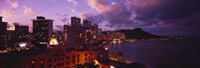 Buildings lit up at dusk, Waikiki, Oahu, Hawaii, USA Fine Art Print