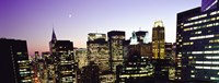 Buildings lit up at dusk, Manhattan Fine Art Print
