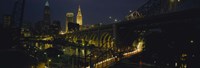 Arch bridge and buildings lit up at night, Cleveland, Ohio, USA by Panoramic Images - 27" x 9"