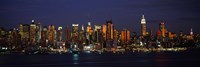 Skyscrapers lit up at night in a city, Manhattan, New York City, New York State, USA Fine Art Print