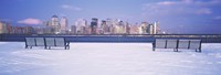 Park benches in snow with a city in the background, Lower Manhattan, Manhattan, New York City, New York State, USA Fine Art Print