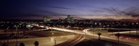 Buildings in a city lit up at dusk, 7th St. Freeway, Phoenix, Maricopa County, Arizona, USA by Panoramic Images - 27" x 9" - $28.99