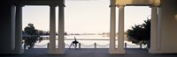 Person stretching near colonnade, Lake Merritt, Oakland, Alameda County, California, USA Fine Art Print