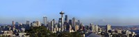 Buildings in a city with mountains in the background, Space Needle, Mt Rainier, Seattle, King County, Washington State, USA 2010 by Panoramic Images, 2010 - 27" x 9" - $28.99