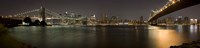 Brooklyn Bridge and Manhattan Bridge across East River at night, Manhattan, New York City, New York State, USA Fine Art Print