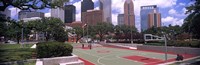 Basketball court with skyscrapers in the background, Houston, Texas Fine Art Print