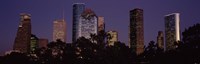 Buildings in a city lit up at dusk, Houston, Harris county, Texas, USA by Panoramic Images - 36" x 12" - $34.99