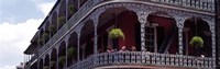 People sitting in a balcony, French Quarter, New Orleans, Louisiana, USA by Panoramic Images - 36" x 12" - $34.99