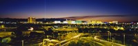 High angle view of buildings lit up at dusk, Las Vegas, Nevada, USA Fine Art Print