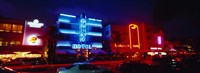 Low Angle View Of A Hotel Lit Up At Night, Miami, Florida, USA Fine Art Print