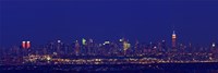 Buildings in a city lit up at night, Upper Manhattan, Manhattan, New York City, New York State, USA Fine Art Print