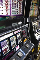 Slot machines at an airport, McCarran International Airport, Las Vegas, Nevada, USA Fine Art Print